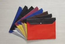 چاپ پوشه دکمه دار پارچه ای یا پوشه طلقی؟ نبرد بین ماندگاری برند و یک انتخاب گذرا